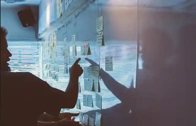 seo consultant facing a whiteboard