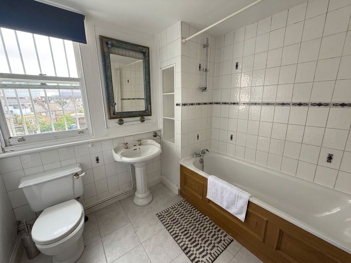 Family bathroom (digitally staged)
