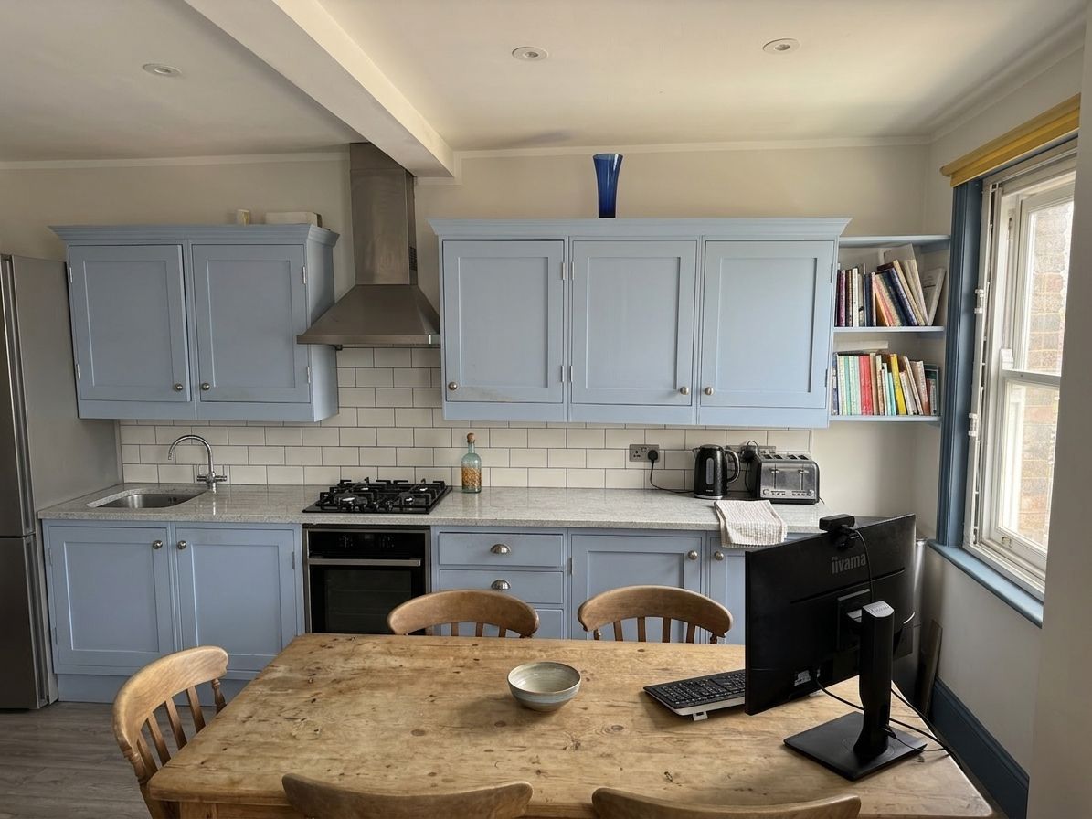 Pale blue shaker kitchen (digitally staged)