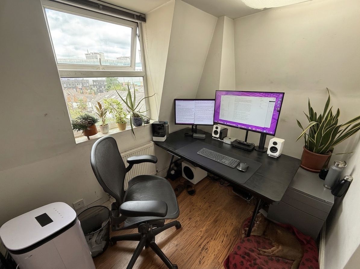 Loft home office with rooftop view (digitally staged)