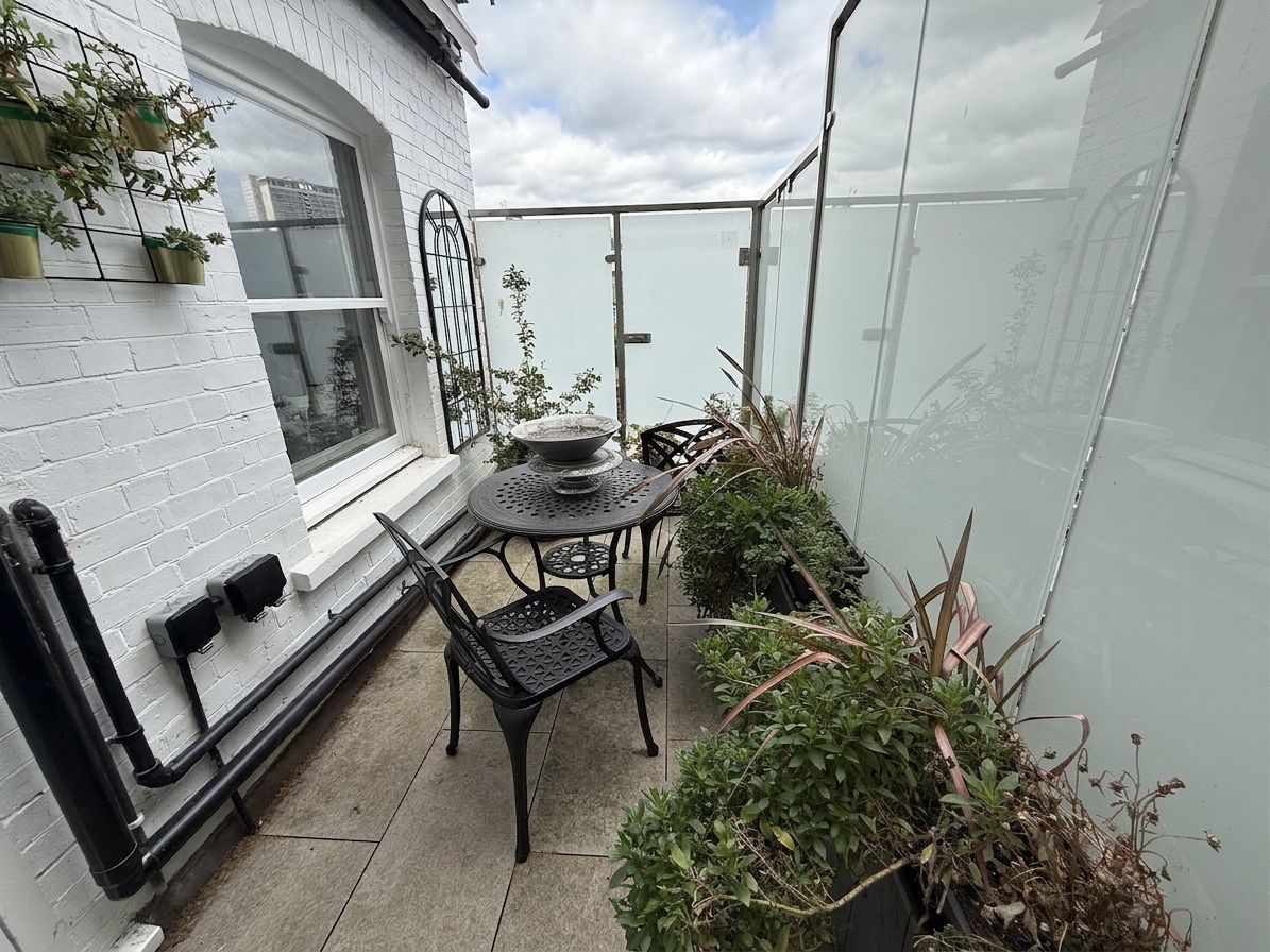 Patio corner (digitally staged)