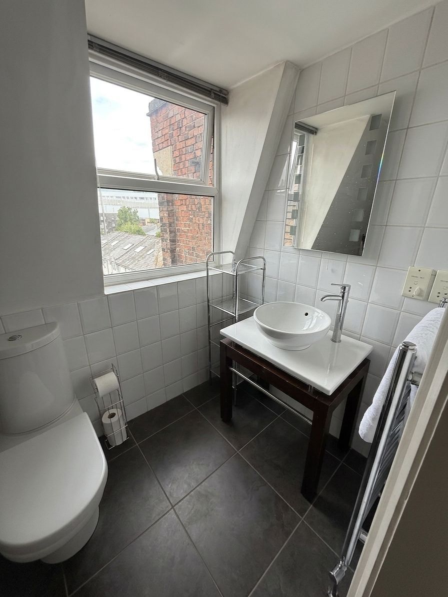 Loft shower room (digitally staged)